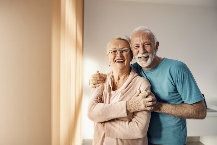 Elderly couple walking hand-in-hand, illustrating the positive impact of penile implant surgery female satisfaction and emotional intimacy